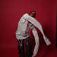 The Scarred Shirt and Holed Trousers