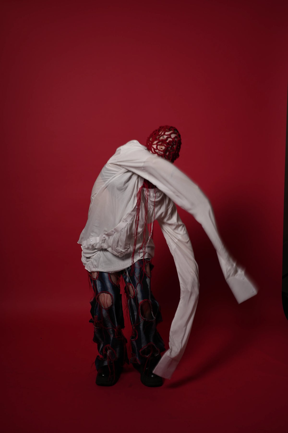 The Scarred Shirt and Holed Trousers