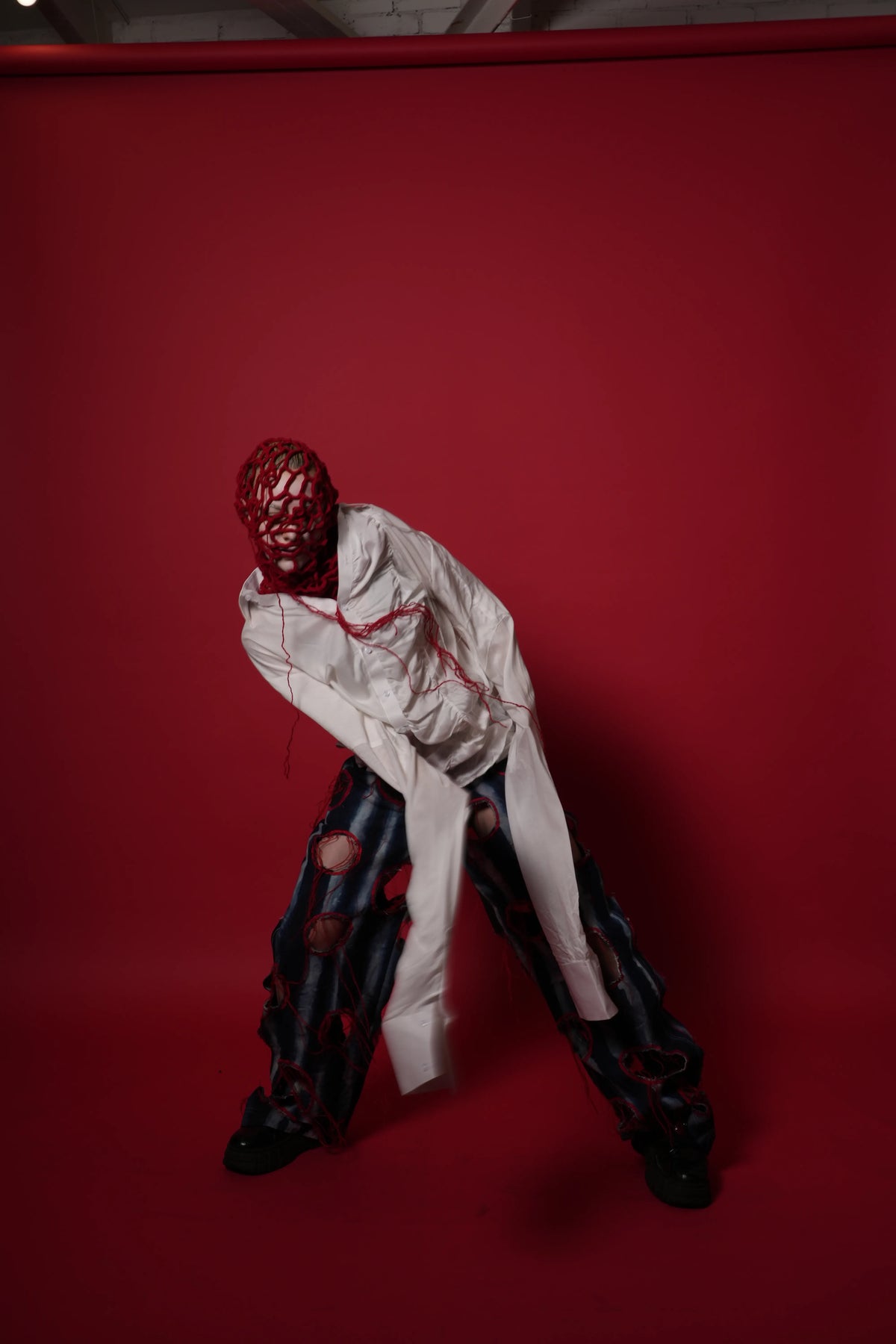 The Scarred Shirt and Holed Trousers