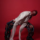The Scarred Shirt and Holed Trousers