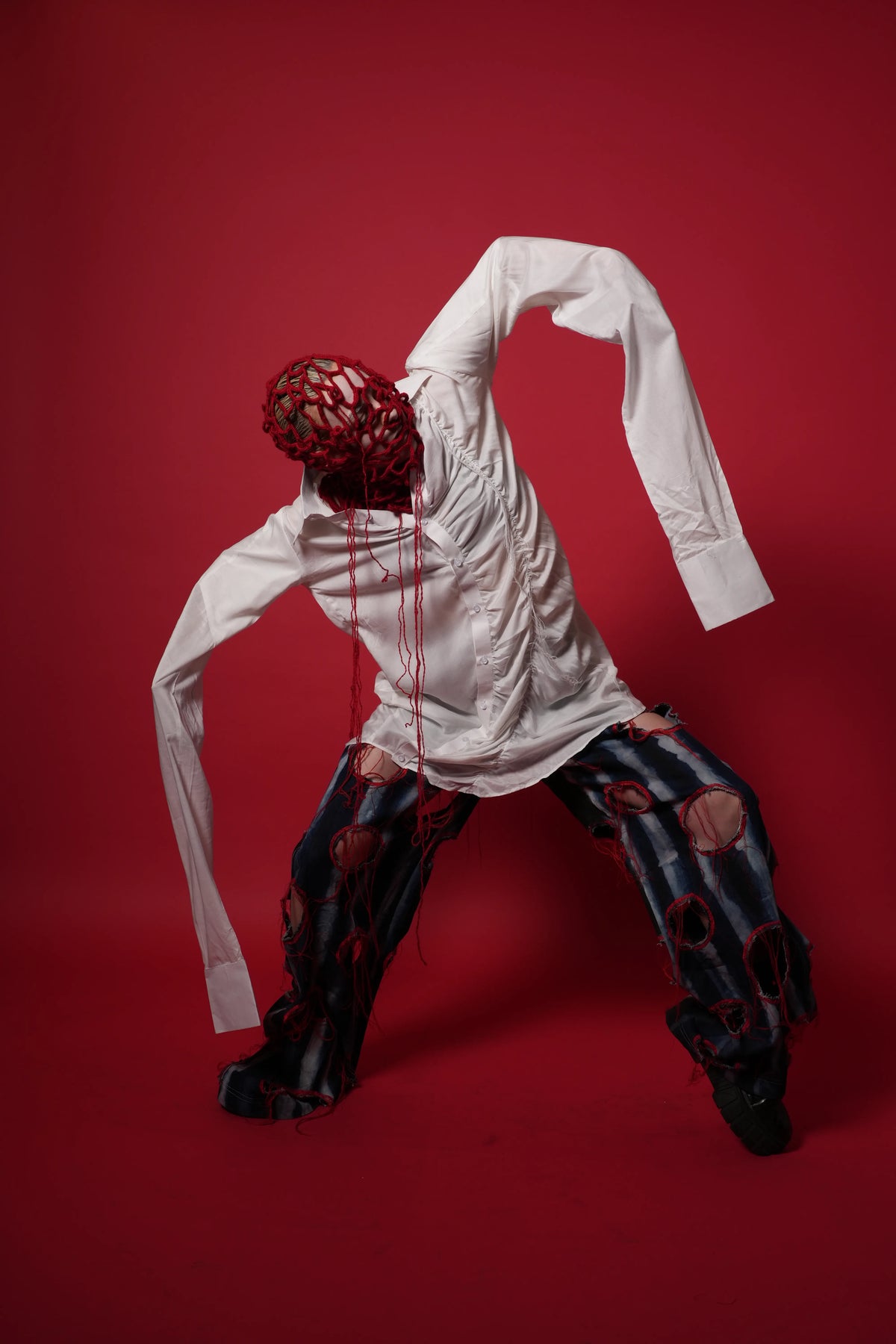 The Scarred Shirt and Holed Trousers