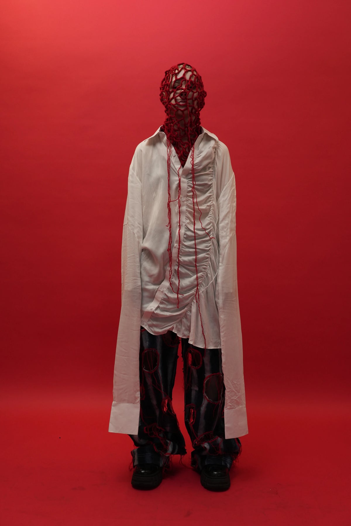 The Scarred Shirt and Holed Trousers