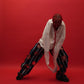 The Scarred Shirt and Holed Trousers
