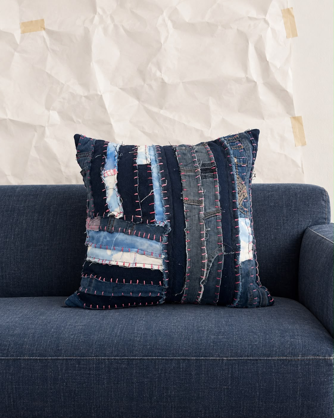 Mended in pink indigo hand patched recycled denim cushion cover