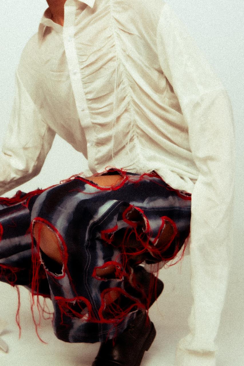 The Scarred Shirt and Holed Trousers