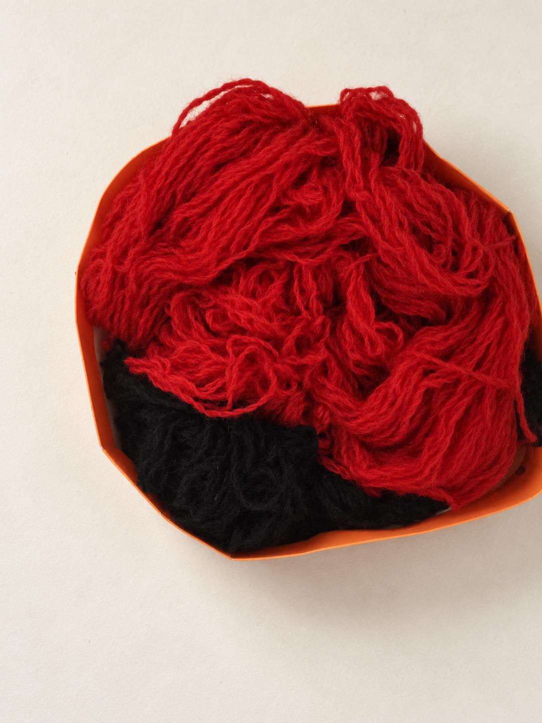 Red and black hand-dyed yarn